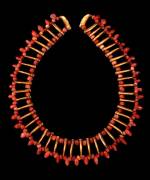 Necklace of red stone and claw shaped beads, Tairona, gold alloy, AD900-1600. Copyright Museo del Oro, Banco de la Republica, Colombia.
