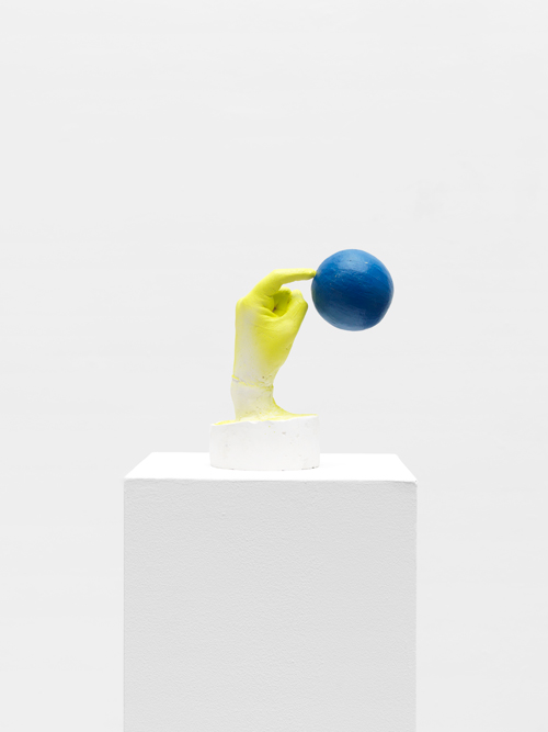 Tamar Ettun. Hand with a Blue Ball, 2015. Plaster, cardboard, paint, 10 x 8 x 5 in.