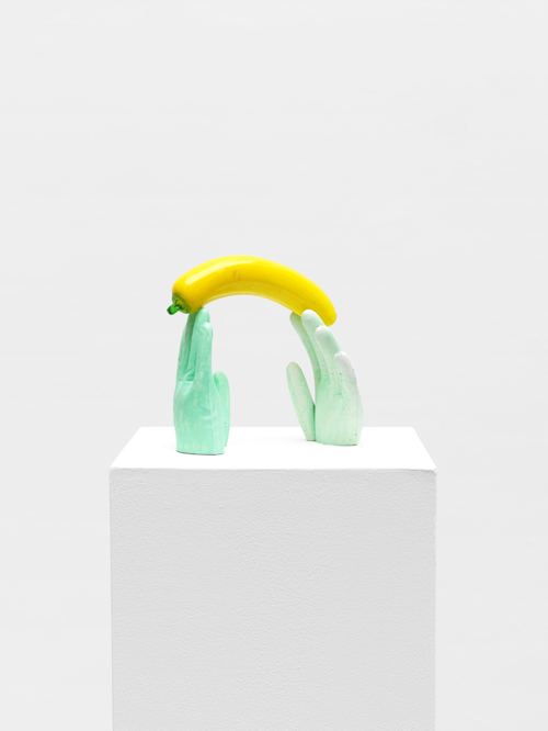 Tamar Ettun. Two Gloves with a Banana, 2015. Plaster, glass, paint, 9 x 9 x 5 in.