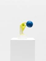 Tamar Ettun. Hand with a Blue Ball, 2015. Plaster, cardboard, paint, 10 x 8 x 5 in.