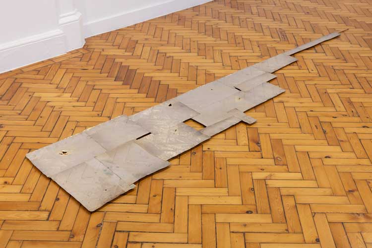 Nat Faulkner, Analogue (Studio floor), 2026. Recycled X-ray silver on copper sheet. Installation view, Nat Faulkner: Strong water, Camden Art Centre, London. Courtesy of the artist and Brunette Coleman. Photo: Rob Harris.