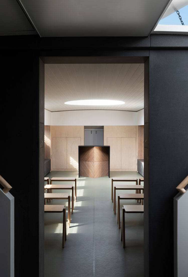 Interior view with flatpack altar and stools. Genesis, a floating faith space, designed by architects Denizen Works. Photo: Gilbert McCarragher.