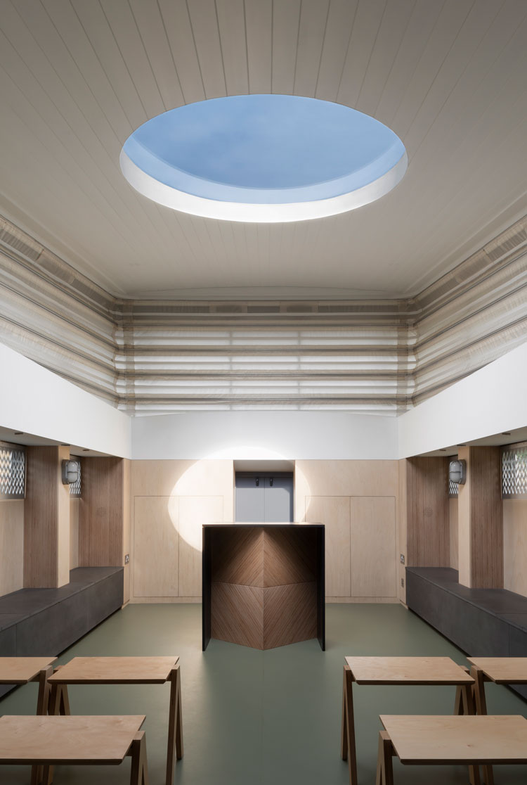 Interior view with roof raised and flatpack altar. Genesis, a floating faith space, designed by architects Denizen Works. Photo: Gilbert McCarragher.
