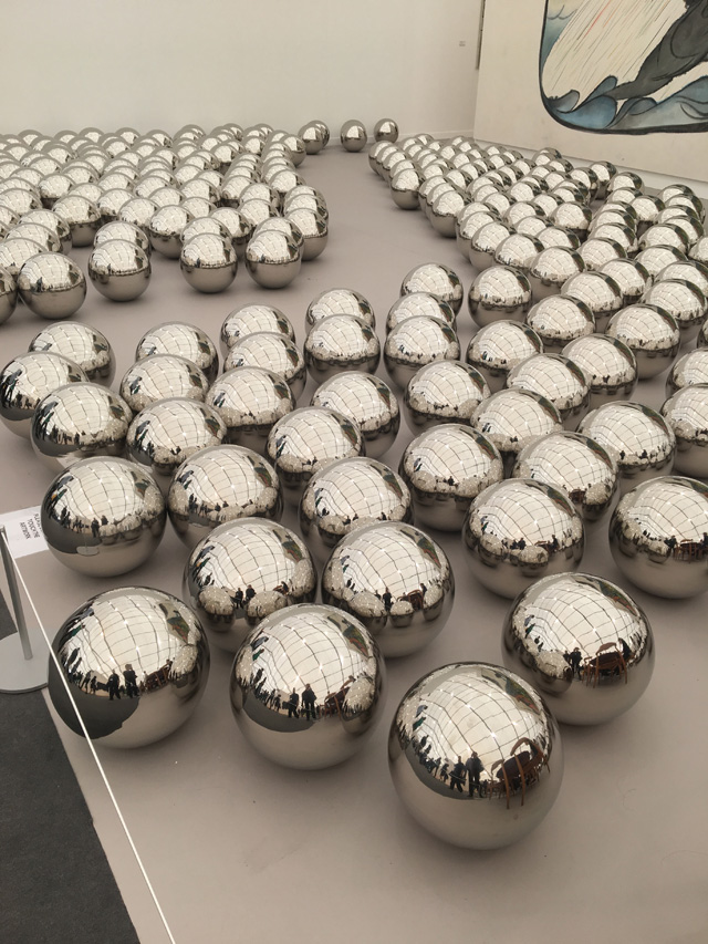 Yayoi Kusama, Narcissus Garden, 1966-.  Stainless steel spheres, 34 cm diameter each. At Frieze New York 2019. Photo © Natasha Kurchanova.