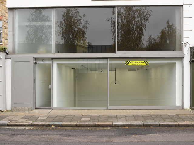 Ceal Floyer. Maximum Headroom, 2014/2018. Site specific custom printed aluminium sign, dimensions variable. © Ceal Floyer. Courtesy Lisson Gallery.