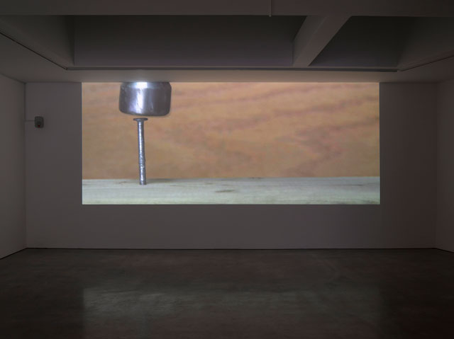 Ceal Floyer. Hammer and Nail, 2018. Video projection with audio, 
dimensions variable. © Ceal Floyer. Courtesy Lisson Gallery.