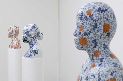 From left to right: Ah Xian, <i>China China – Bust 34</i> 1999. Porcelain, underglaze paint, 42 x 40 x 22 cm. Ah Xian, <i>China China – Bust 35</i> 1999. Porcelain, underglaze paint, 40 x 39 x 21 cm. Ah Xian, <i>China China – Bust 50</i> 1999. Porcelain, underglaze and overglaze paint, 40 x 38 x 20 cm. Courtesy the artist. Photo: Jens Ziehe