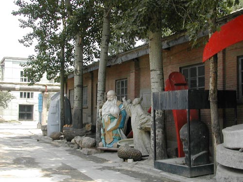 Sculptures left in the open space inside 798