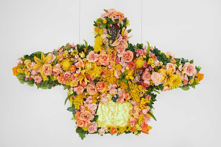 Devan Shimoyama. February II, 2019. Silk flowers, rhinestones, jewelry, sequins, and embroidered patch on cotton hoodie with steel armature, coated wire and fishing line, 45 × 72 × 12 in. (114.3 × 182.9 × 30.5 cm). Courtesy Private Collection and De Buck Gallery, New York. Photo: Phoebe dHeurle.