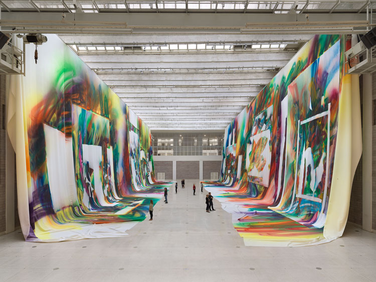 Katharina Grosse, Wunderbild, 2018. Acrylic on fabric, 1,450 x 5,620 x 670 cm and 1,450 x 5,490 x 690 cm. Installation view National Gallery in Prague, Czech Republic. Photo: Jens Ziehe; Commissioned by National Gallery in Prague; Courtesy Galerie nächst St. Stephan Rosemarie Schwarzwälder, Gagosian, and König Galerie. © 2020 Katharina Grosse and VG Bild-Kunst, Bonn.