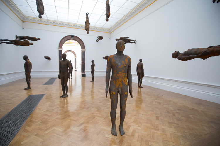 Antony Gormley, Lost Horizon I, 2008. 24 cast iron bodyforms, each 189 x 53 x 29 cm. Installation view, Antony Gormley, Royal Academy of Arts, London, 21 September – 3 December 2019 © the Artist. Photo: David Parry / © Royal Academy of Arts.