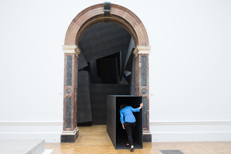 Antony Gormley, Cave, 2019. Approximately 27 tonnes of weathering steel, 14.11 x 11.37 x 7.34 m. Installation view, Antony Gormley, Royal Academy of Arts, London, 21 September – 3 December 2019 © the Artist. Photo: David Parry / © Royal Academy of Arts.