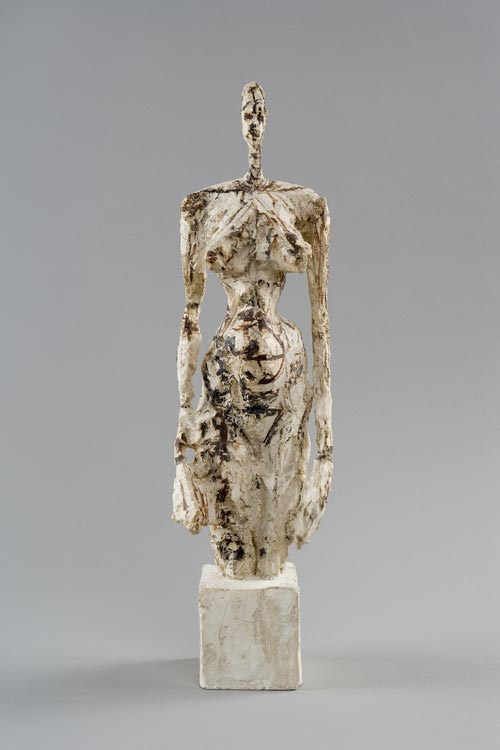 Alberto Giacometti. <em>Nude on a Cubic Pedestal</em>, 1953. Plaster reworked with a knife and paint, 43.5 x 11.7 x 11.8 cm. Fondation Alberto et Annette Giacometti, Paris © Adagp