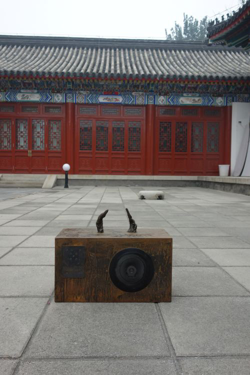 Anita Glesta. Sound sculpture with figure on top (horns), installed in the courtyard.