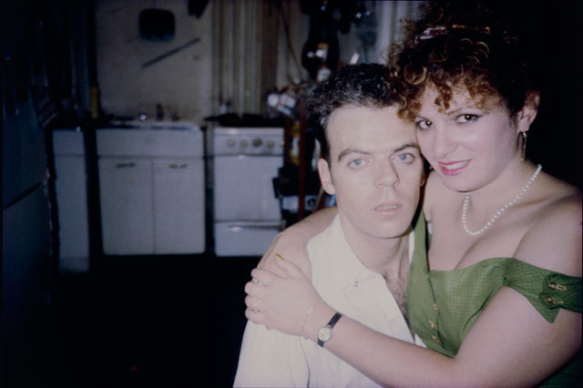 Nan Goldin. Nan on Brian’s Lap, Nan’s Birthday, New York City, 1981. Silver dye bleach print, printed 2008, 15 1/2 x 23 1/8 in (39.3 x 58.7 cm). The Museum of Modern Art, New York. Purchase. © 2016 Nan Goldin.