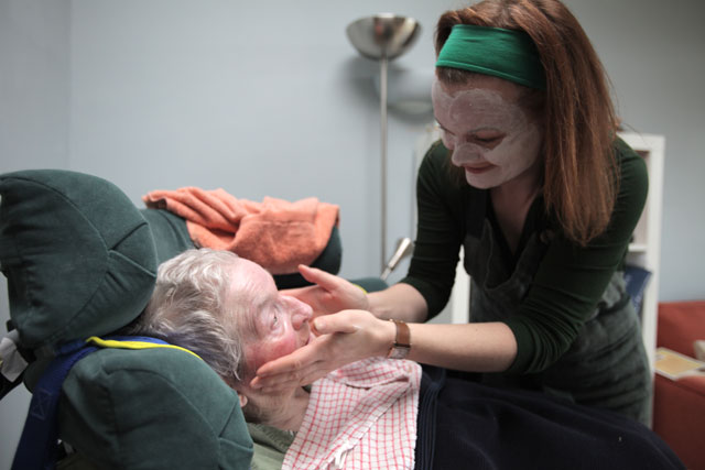 The Closer We Get, 2015. Karen gives her mother, and herself, a facial. Photograph: Nina Pope.