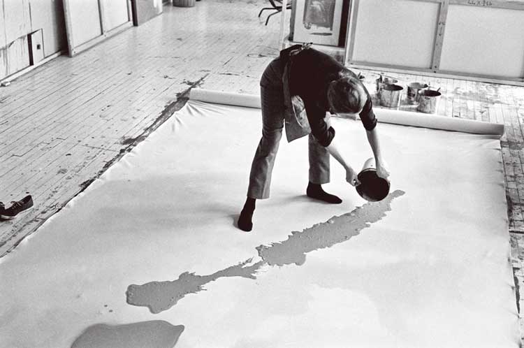 Helen Frankenthaler at work on a large canvas, 1969. Photo: Ernest Haas. © Helen Frankenthaler Foundation.