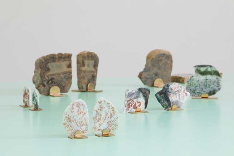 Ilana Halperin. The Rock Cycle (from stromatolites to diamonds), 2026. Fossilised stromatolites with bespoke brass stands; 3 works. Laser-engraved Scottish marble from Iona, Skye, Ledmore and Loch Duich with handmade ink composed of a core sample of soil from James Hutton’s farm and pure malachite with bespoke brass stands. Courtesy the artist and Patricia Fleming Gallery. Photo: Ruth Clark.