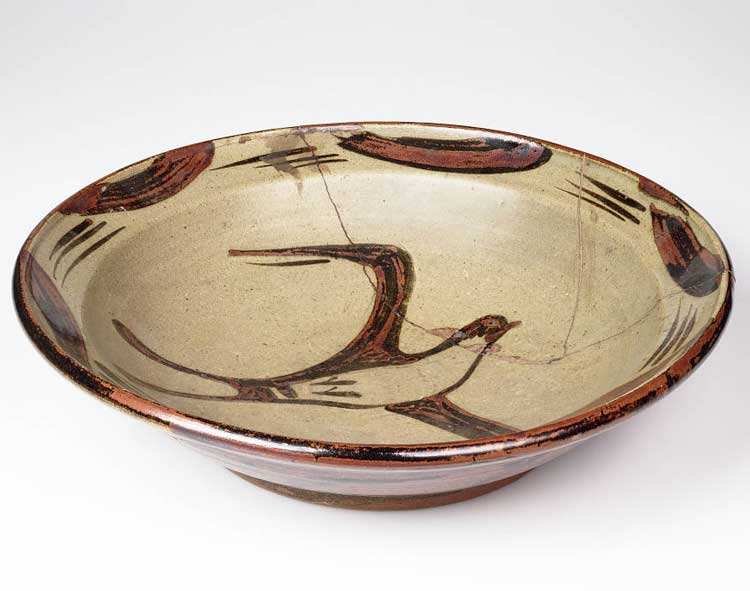 Bernard Leach. Large wide rimmed dish, grey-green and brown, 1930s. Stoneware, celadon glaze brushed with iron. Image kindly provided by the Crafts Study Centre, University for the Creative Arts.