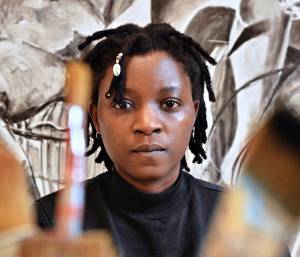 Kudzanai-Violet Hwami in her studio at Gasworks, London, 2019.