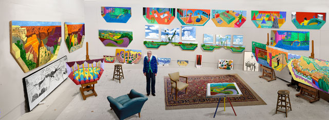 David Hockney. In the Studio, December 2017, 2017. Photographic drawing printed on seven sheets of paper, mounted on seven sheets of Dibond sheet size: 109-1/2 x 42-3/4 in, each 9ft 1-1/2 x 24ft 11-1/4 in (278.1 cm x 760.1 cm), overall installation dimensions. Photograph courtesy Pace Gallery. © 2018 David Hockney.