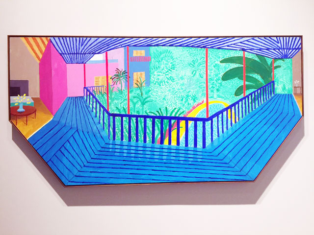 David Hockney. A Bigger Interior with Blue Terrace and Garden, 2017. Acrylic on canvas, 48 x 96 in (121.9 cm x 243.8 cm). Photograph: Jill Spalding.