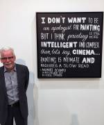 Peter Hill at the opening of Geelong Art Prize 2016, with his painting In Advance of the Concept Painting, 2016, a tribute to Duchamp’s In Advance of the Broken Arm. 100 x 100 cm.