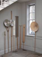 Nicky Hirst. Into The Woods, 2010-2017. An assortment of placards, found objects on sticks, left to right: Translation (2010), Nocturne (2010), Flail (2011), Spindles (2017), Standard (2010), Halo (2011), Aperture (2016), Frill (2015). Courtesy the artist and Domobaal. Photograph: Andy Keate.