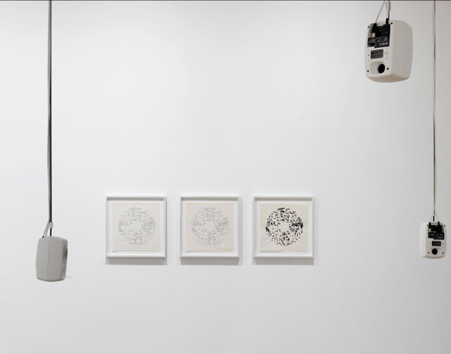 Foreground: Mark Fell. Interpretation of Sonakinatography, Composition III, 2016. Multi-speaker installation. Courtesy the artist; Background: Channa Horowitz. Round in Three Parts, 1977. Ink on paper. Courtesy the Estate of Channa Horowitz.