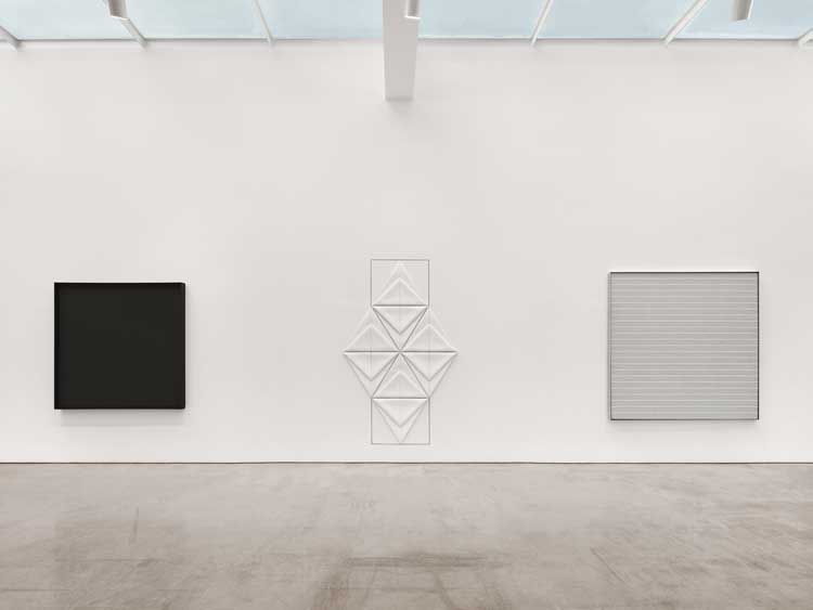 Left to right: Ad Reinhardt, Abstract Painting, 1963, oil on canvas, 60 × 60 in (152.4 × 152.4 cm); Dorothea Rockburne, Egyptian Painting: Scribe, 1979, conté, pencil, oil, gesso on linen, 93 × 56 1/2 in (236.2 × 143.5 cm); Agnes Martin, Untitled #11, 1985, acrylic on canvas, 72 3/4 × 72 3/4 in (184.8 × 184.8 cm). Installation view, Marlborough Gallery, New York. Photo: Olympia Shannon.