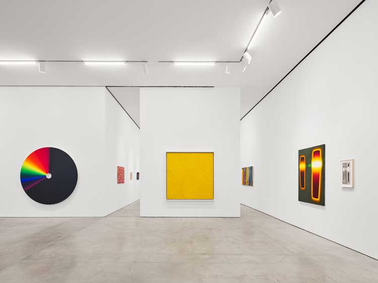 Left to right: Olafur Eliasson, Colour experiment no. 29 (light spectrum), 2010, oil on canvas, 78 5/8 × 79 × 2 3/4 in (199.7 × 200.7 × 7 cm); Yayoi Kusama, Infinity-Nets [EBP], 2011, acrylic on canvas, 63 3/4 × 63 1/2 in (161.9 × 161.3 cm); Gerard Mossé, From My Head Down To My Shoes, 2019-21, oil on linen, 56 × 42 in (142.2 × 106.7 cm); Untitled, 2020-21, charcoal, graphite, and pastel on paper, 17 × 7 7/8 in (43.2 × 20 cm). Installation view, Marlborough Gallery, New York. Photo: Olympia Shannon.