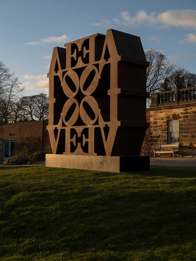 Robert Indiana, LOVE WALL, 1966-2006, installation view at Yorkshire Sculpture Park, 2022. Photo: © Jonty Wilde, courtesy of Yorkshire Sculpture Park. Artwork: © 2022 Morgan Art Foundation Ltd./ Artists Rights Society (ARS), New York/DACS, London.
