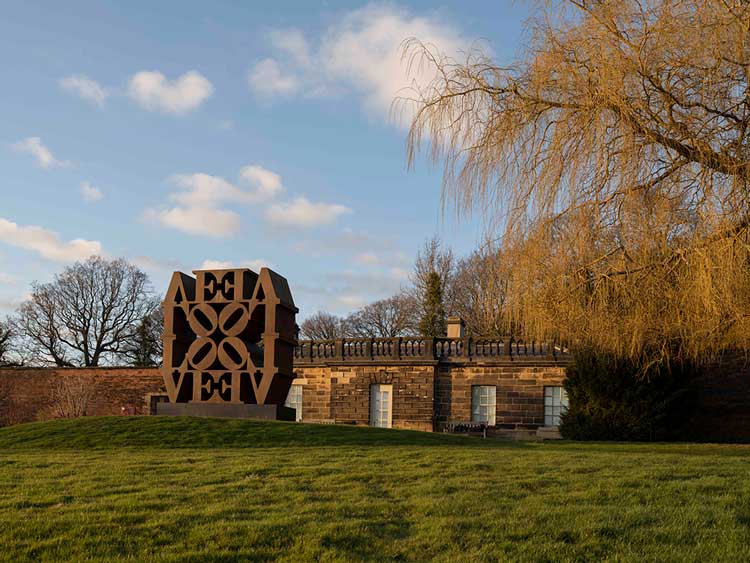 Robert Indiana, LOVE WALL, 1966-2006, installation view at Yorkshire Sculpture Park, 2022. Photo: © Jonty Wilde, courtesy of Yorkshire Sculpture Park. Artwork: © 2022 Morgan Art Foundation Ltd./ Artists Rights Society (ARS), New York/DACS, London.