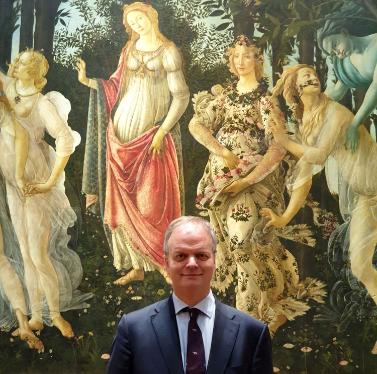Eike Schmidt with Sandro Botticelli's Primavera, Uffizi, Florence.