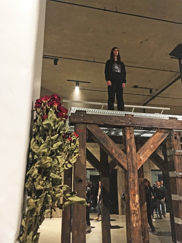 Eliza Douglas on platform, Anne Imhof: Sex at Tate Modern 2019. Photo: Veronica Simpson.