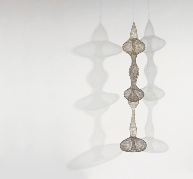 Ruth Asawa (American, 1926‒2013). Untitled (S.540, Hanging, Seven-Lobed, Interlocking Continuous Form within a Form), c1958. Brass and copper wire. The Shidler Family Collection. Artwork © Estate of Ruth Asawa.