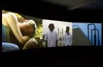 Yang Fudong. <em>Flutter, Flutter... Jasmine, Jasmine</em>, 2002. Three-channel video installation, colour, 17min 40sec. Courtesy Marian      Goodman Gallery, New York/Paris and ShanghART Gallery, Shanghai © the artist. Parasol unit installation shot. Photo Stephen White.