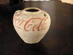 Ai Weiwei. Han Jar Overpainted with Coca-Cola Logo, 1995. Earthenware, paint, H. 9 7/8 in. (25 cm); Diam. 11 in. (28 cm). Lent by M+ Sigg Collection, Hong Kong. © Ai Weiwei.