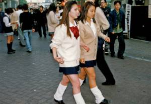 <p><em>Kogal wearing school uniform and loose socks</em>, 1997. Photo: © www.web-across.com (Parco Co., Ltd.)