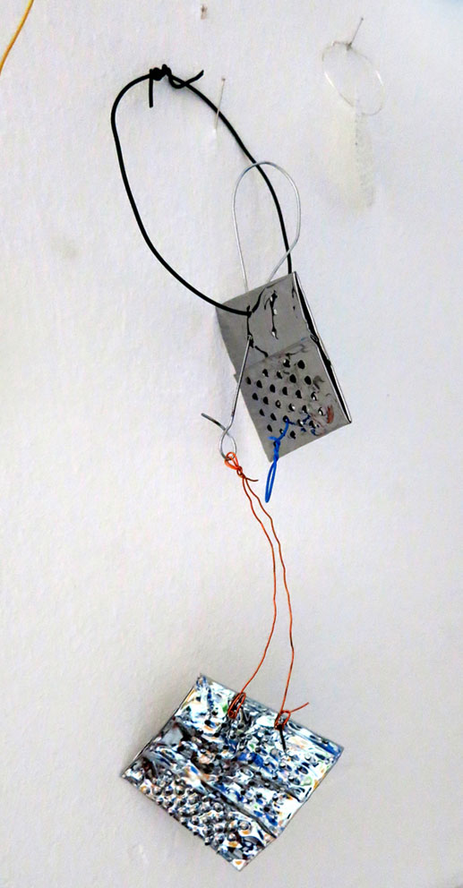 Clare Jarrett. From Thought Cupboard, 2015. Found objects and wire, 15 x 15 cm.
