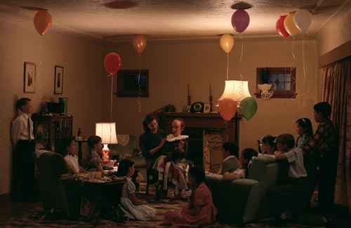 Jeff Wall, <em>A ventriloquist at a birthday party in October 1947</em>, 1990. Silver dye bleach transparency in light box 90 3/16 x 138 3/4 in. (229 x 352.5 cm). Emanuel Hoffmann-Stiftung, on permanent loan to the Oeffentliche Kunstsammlung Basel © Jeff Wall 