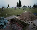 Jeff Wall, <em>The Flooded Grave</em>, 1998ˆ2000. Silver dye bleach transparency in light box 89 15/16 x 111 in. (228.5 x 282 cm). The Art Institute of Chicago, promised gift of Pamela J. and Michael N. Alper; Claire and Gordon Prussian Fund for Contemporary Art; Harold L. Stuart Endowment; through prior acquisitions of the Mary and Leigh Block Collection © Jeff Wall 