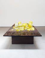 Rashid Johnson. Untitled (shea butter table), 2016. Shea butter, Persian rug, branded walnut, 139.7 x 517.5 x 184.2 cm (55 x 203 3/4 x 72 1/2 in).