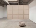Kimsooja, Meta-Painting, 2024. Linen canvas stretched on wooden frame, bottari made of linen canvas and used linen clothes, 200 x 300 x 3 cm (painting), 50.8 x 71.1 x 68.6 cm (bottari). Courtesy the artist and Tanya Bonakdar Gallery, New York / Los Angeles.