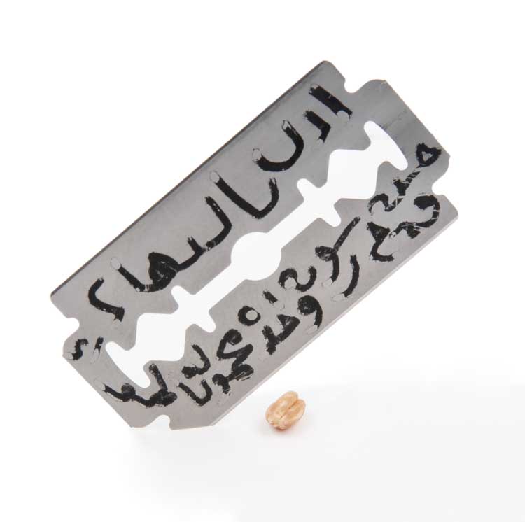 Issam Kourbaj, Threat, 2020. Single Syrian wheat seed under razor blade. Photo: This Is Photography. Courtesy the artist.