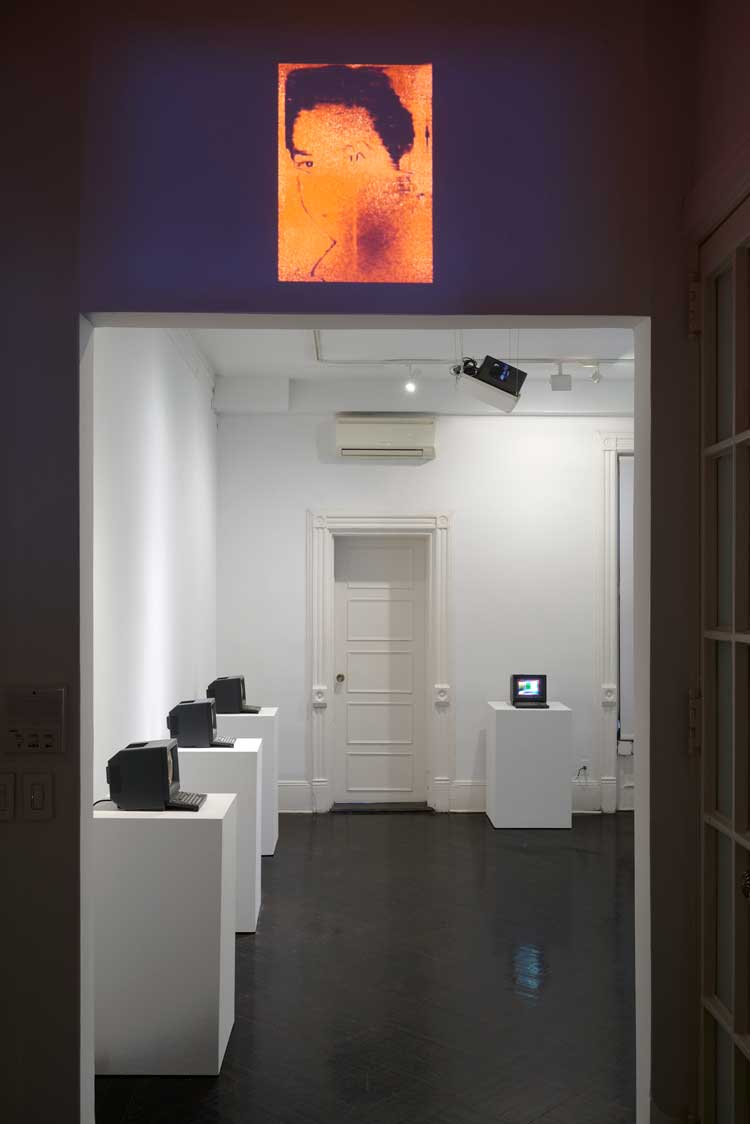 Eduardo Kac, From Minitel to NFT exhibition view. Self-Portrait II, GIF animation, 1996, (above). Photo: Arturo Sanchez.