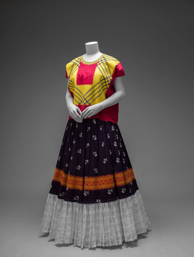 Cotton huipil with machine-embroidered chain stitch; printed cotton skirt with embroidery and holán. Ensemble from the Isthmus of Tehuantepec. Photo: Javier Hinojosa. © Diego Riviera and Frida Kahlo Archives, Banco de México, Fiduciary of the Trust of the Diego Riviera and Frida Kahlo Museums.