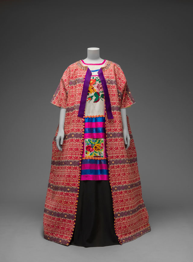Guatemalan cotton coat worn with Mazatec huipil and plain floor-length skirt. Museo Frida Kahlo. © Diego Rivera and Frida Kahlo Archives, Banco de México, Fiduciary of the Trust of the Diego Riviera and Frida Kahlo Museums.
