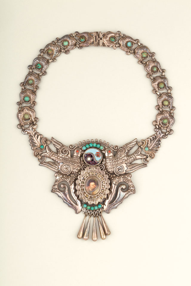 Necklace of silver, enamel, turquoise and coral with hinged compartment, made by Matilde Poulat, Mexico City, c1950. Museo Frida Kahlo. Photo: Javier Hinojosa. © Diego Riviera and Frida Kahlo Archives, Banco de México, Fiduciary of the Trust of the Diego Riviera and Frida Kahlo Museums.