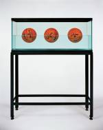 Jeff Koons. Three Ball 50-50 Tank (Spalding Dr. JK Silver Series), 1985. Glass, steel, distilled water, three basketballs, 60 1/2 x 48 3/4 x 13 1/4 in (153.7 x 123.8 x 33.7 cm). Edition of 2. © Jeff Koons.